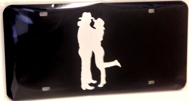 “Cowboy Couple” Mirrored License Plate Dark