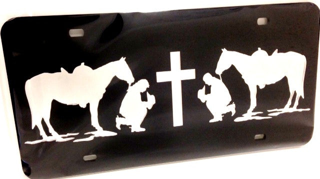 “Praying Cowboy & Cowgirl” Mirrored License Plate Dark